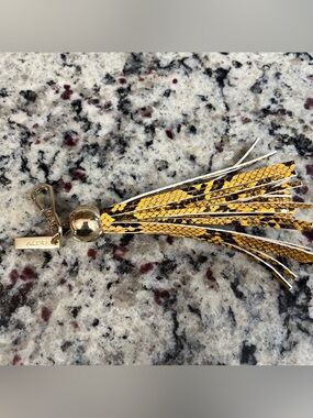 Aldo Yellow Black Snake-Print Tassel Keychain with Gold Hardware